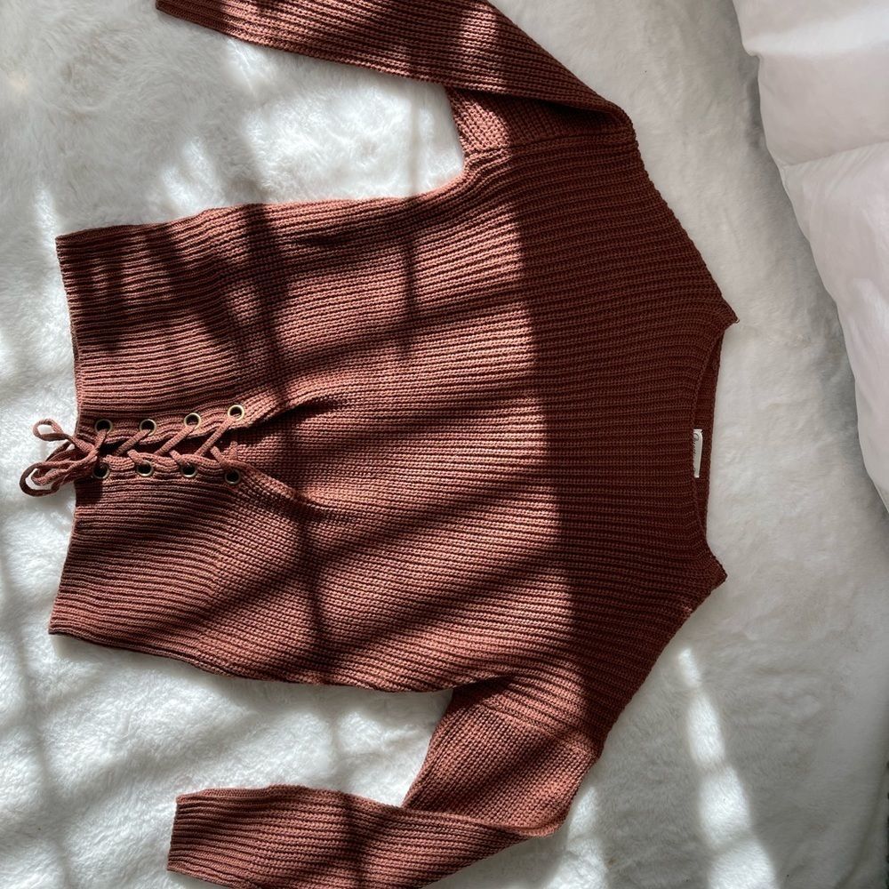 Questions size medium sweater